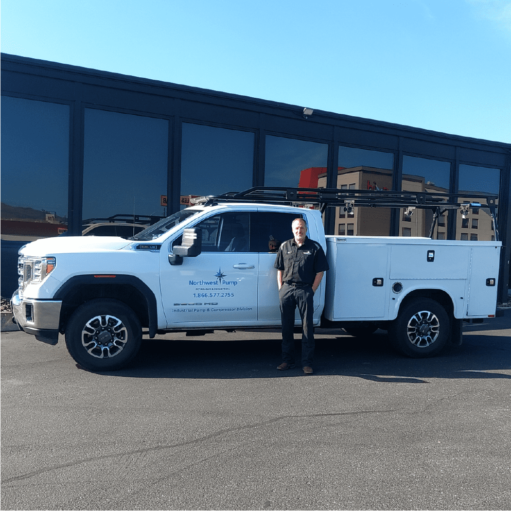 Tom Leidholdt next to his work truck