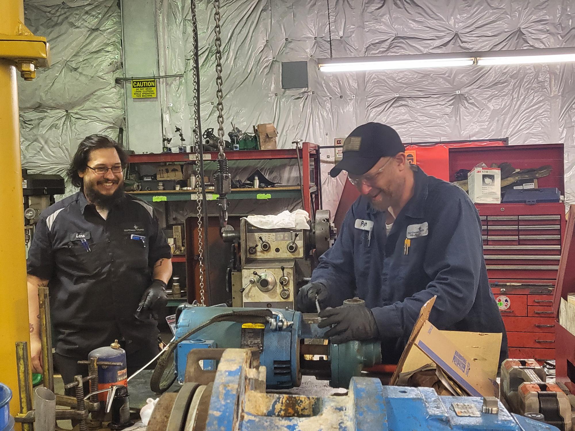 Two NW Pump engineers working on a centrifugal pump